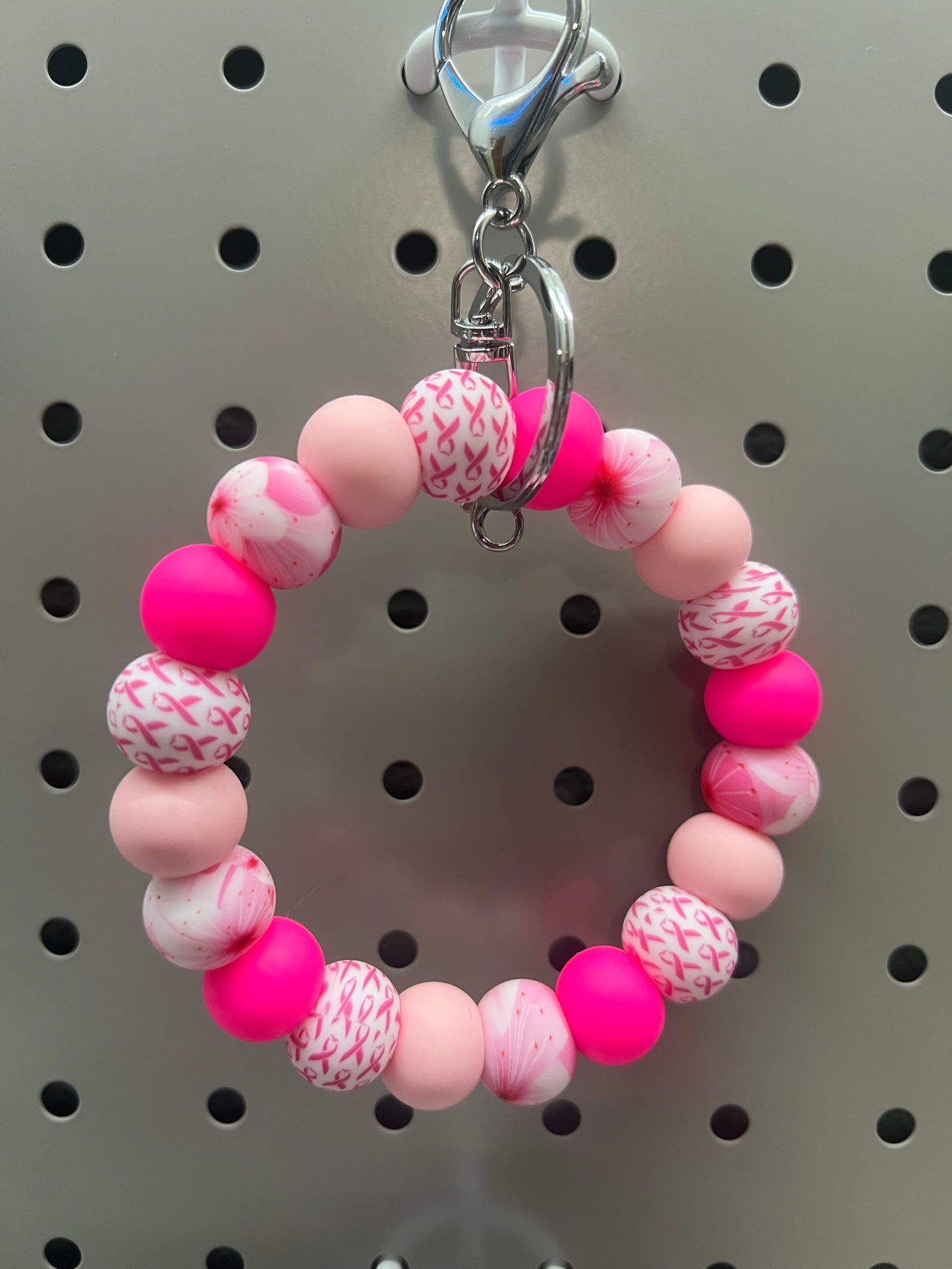 Breast cancer wristlet